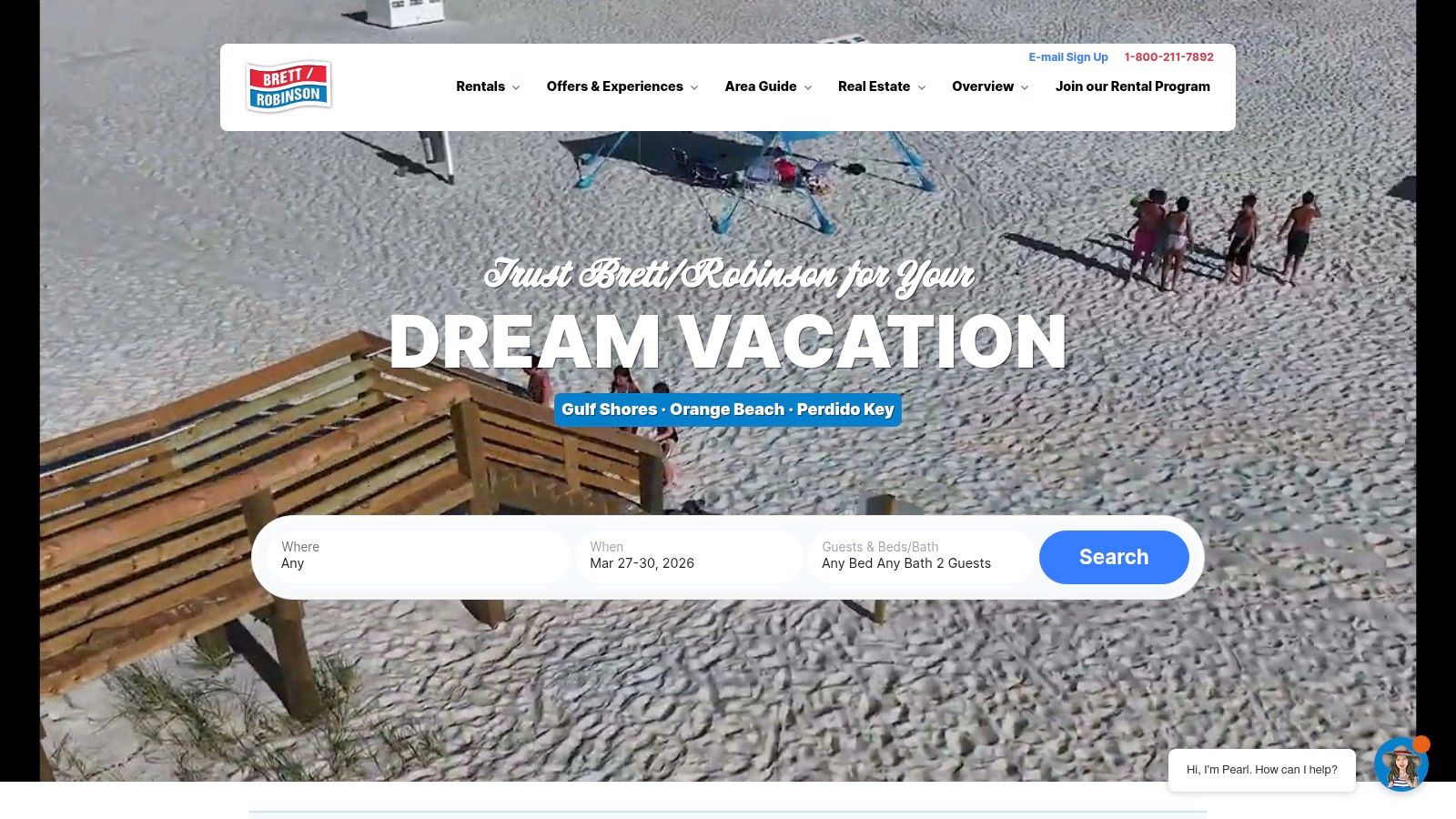 A family enjoys the beach in front of a Phoenix condo tower, a classic Brett/Robinson gulf coast beach house rentals option